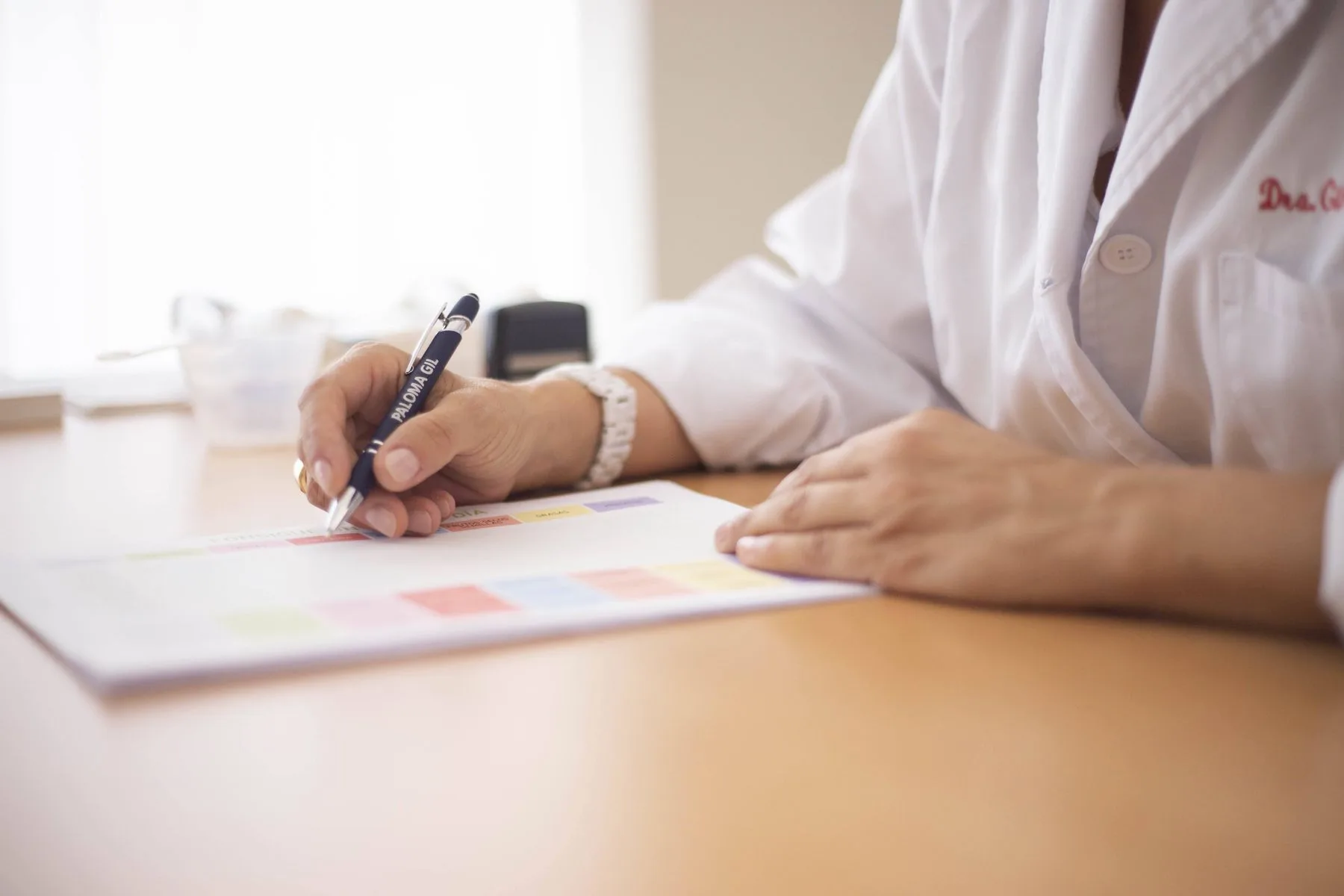 A doctor writing a prescription